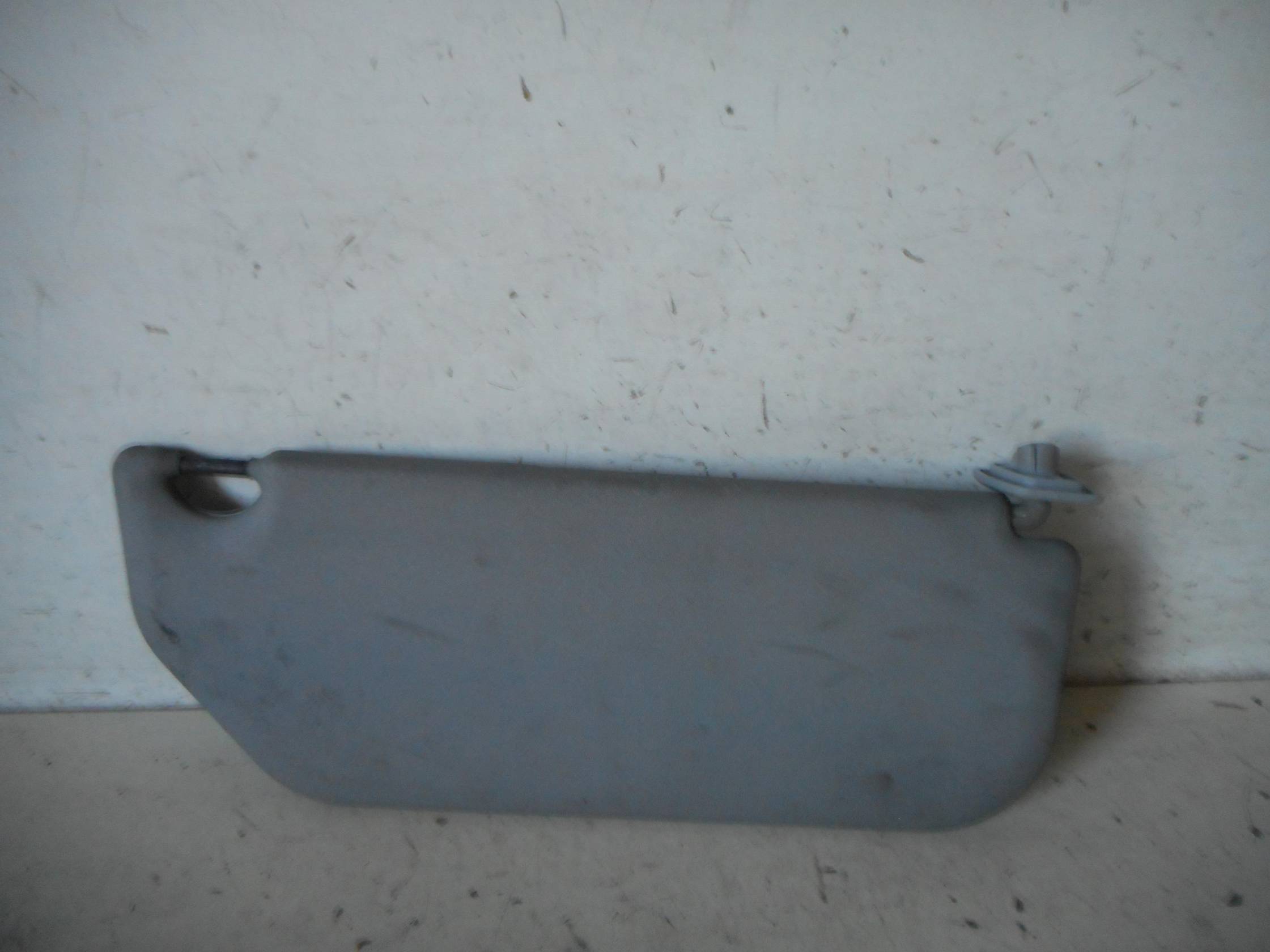 Aletta parasole parabrezza sx.